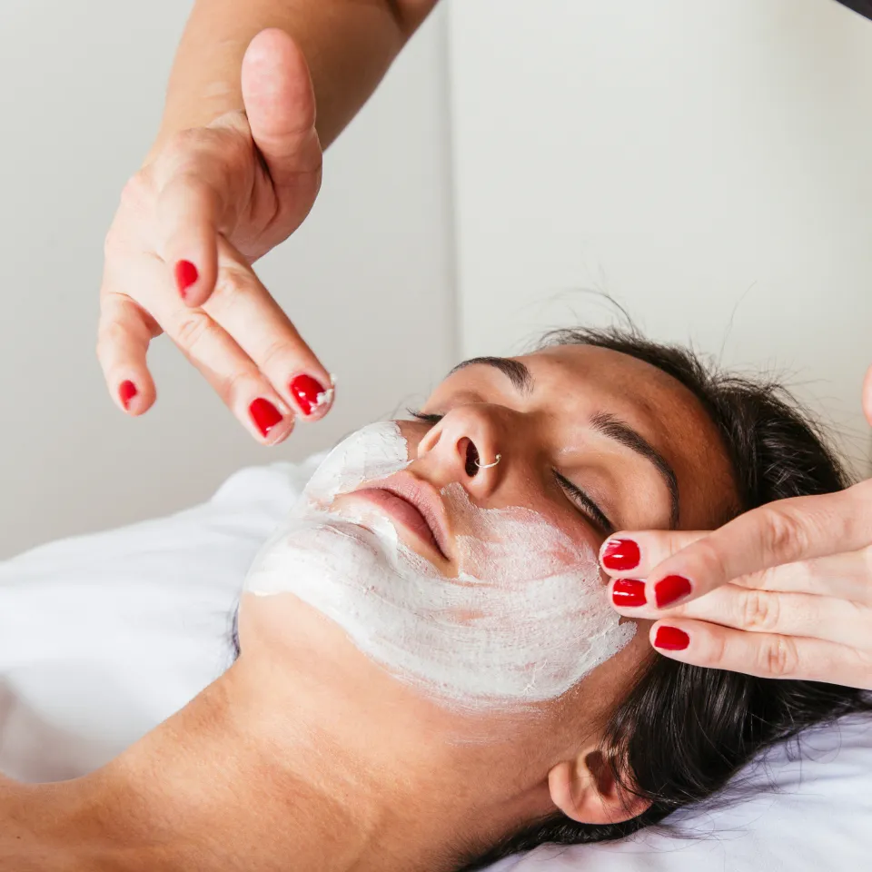 Lady getting a facial
